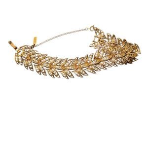 Vintage 1960’s signed Monet articulated gold tone bracelet w/safety chain EVC